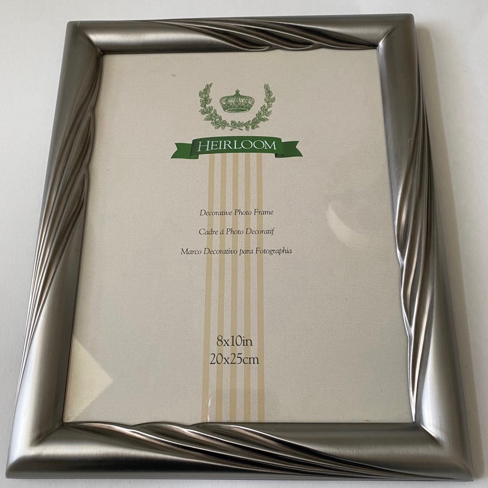 Three Silver Colored Picture Frames 8x10